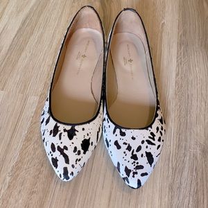 Cow print pointed-toe ballet flats